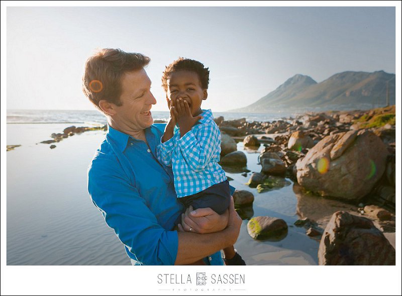 Fun family shoot with young child at beach