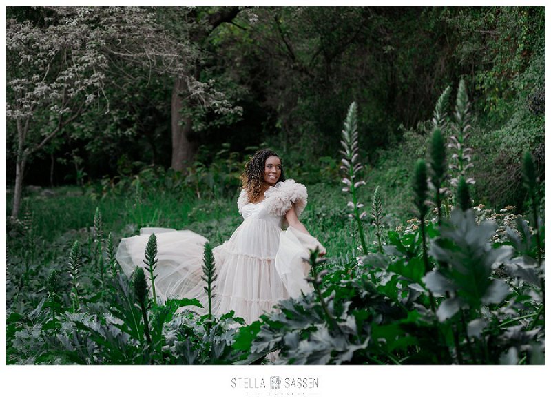 Soft, flowing maternity dress during photo shoot in forest