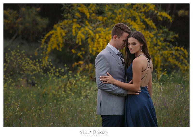 Matric dance photo of couple with flowers 