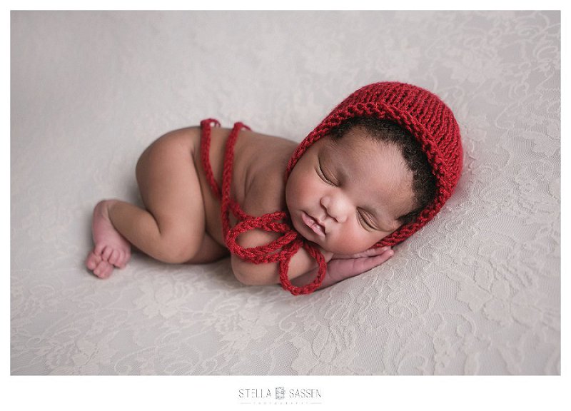 One week old baby posed for newborn shoot