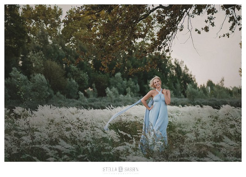 Glamour photo of woman in field of flowers