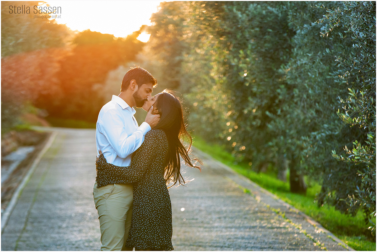 a couple standing in a road at sunset at Clouds Estate after getting engaged
